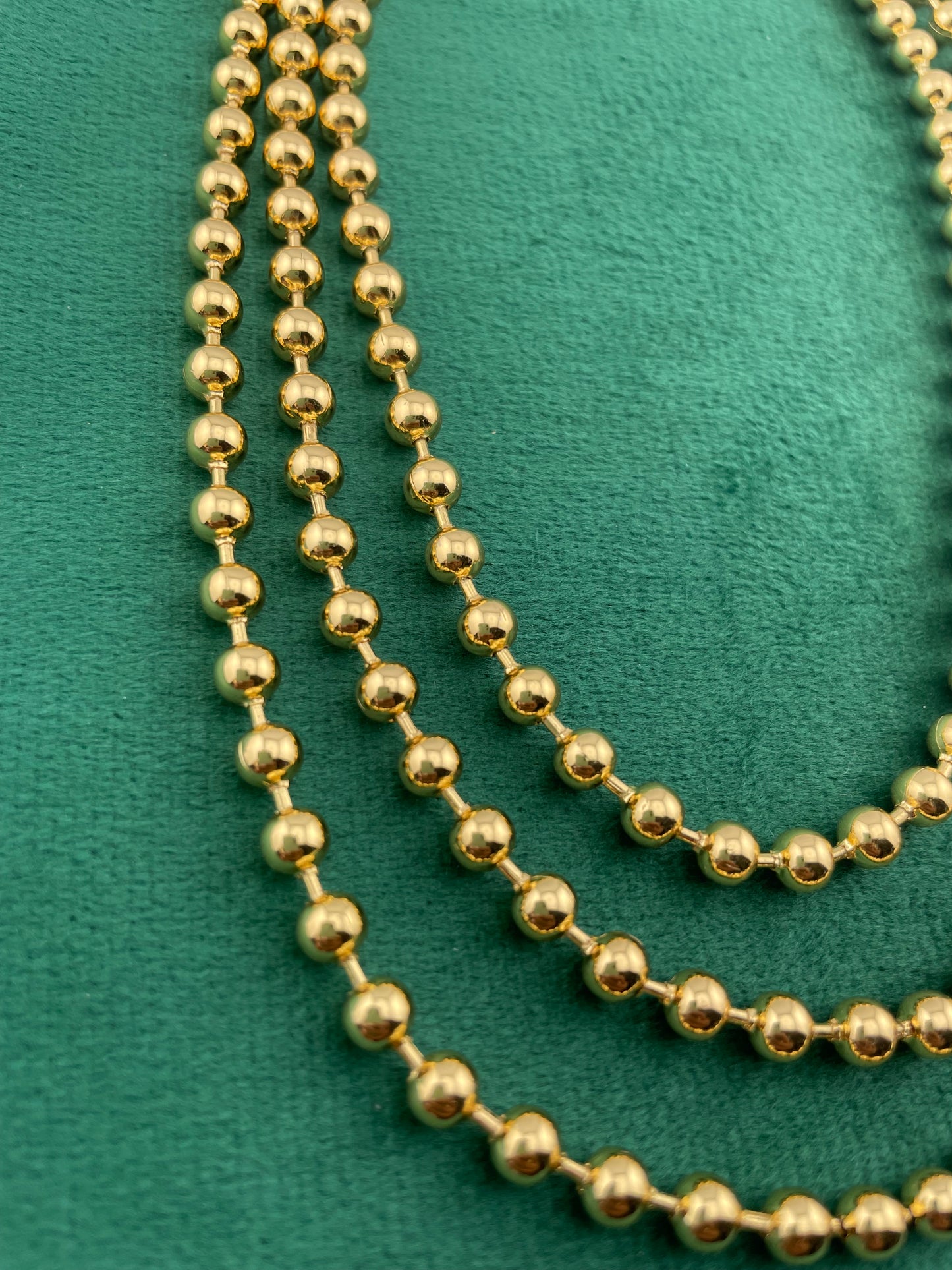 Gold chains, bead chain